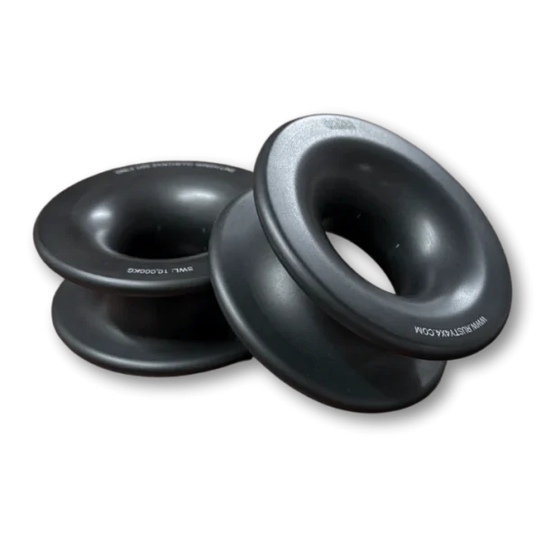 Close-up of a Rusty 4x4 15-Ton Winch Ring, a heavy-duty synthetic rope snatch block made from durable metal alloy, designed for offroad recovery with a smooth friction surface and circular opening for UHMWPE Dyneema winch lines.