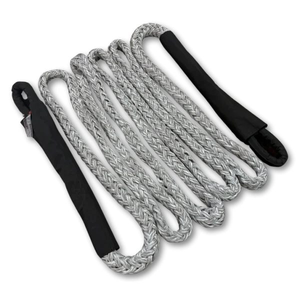 Heavy-duty 72-ton static recovery rope with protective sleeves, coiled for industrial towing.